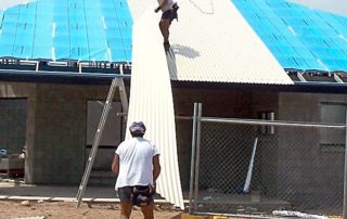 The team performing a colorbond roofing project in Gymea